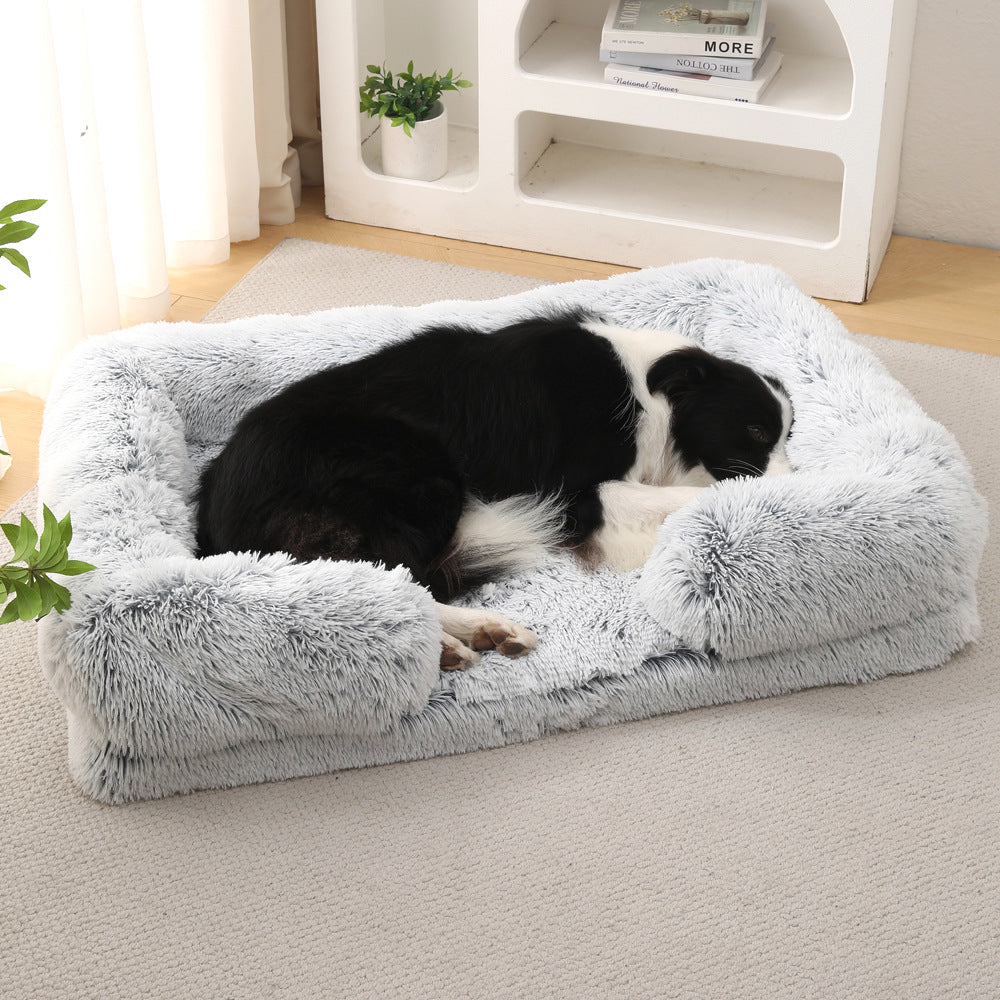 Dog resting in donut bed