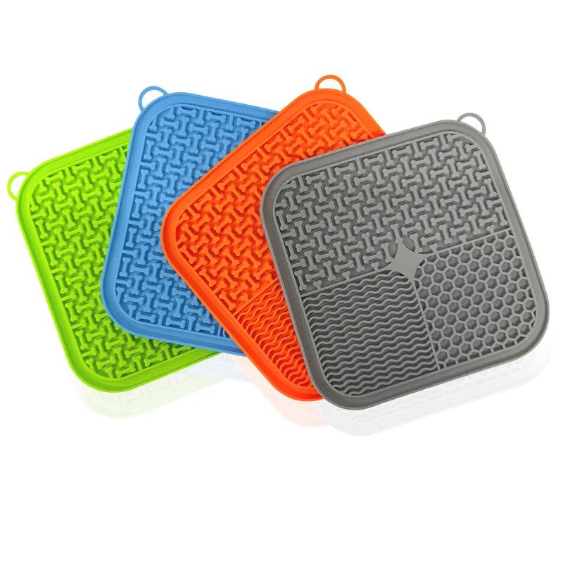 Licking mats stacked showing all four colours